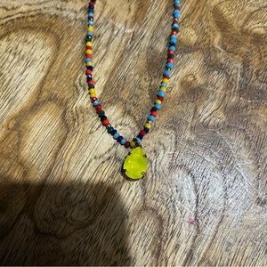 Pink Panache multi colored beaded necklace with a bright yellow pear crystal